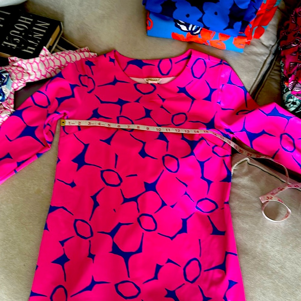 Mahi Gold BIMINI (?) dress. Curved hem